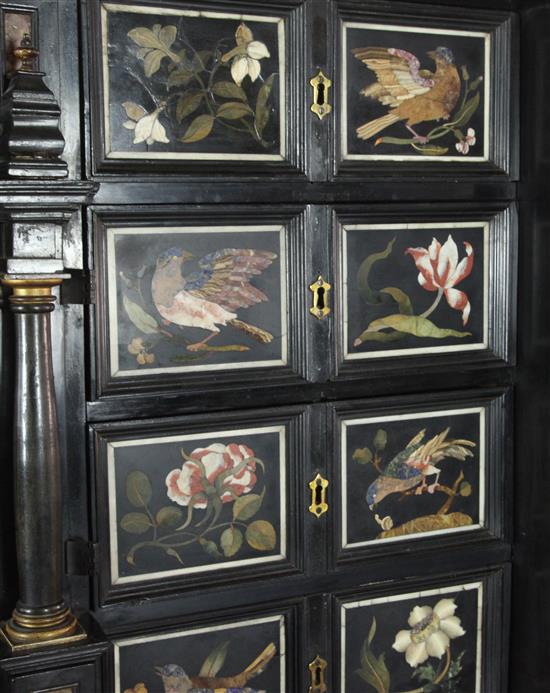 A 17th/18th century Italian and later pietra dura and ebony veneered cabinet on an ebonised wood stand, W.4ft 2in. D.1ft 7in. H.4ft 6.5